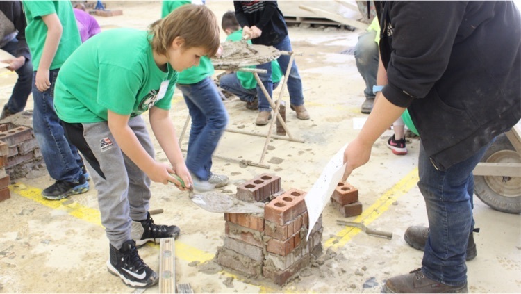 summer camp at the washington county career center kids lay bricks